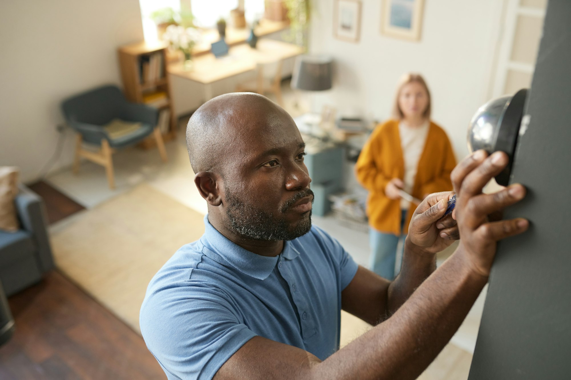 Black Man Doing Home Maintenance Service